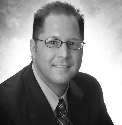 Headshot of Brian Burke, Owner and Managing Broker of Kenna Real Estate Group
